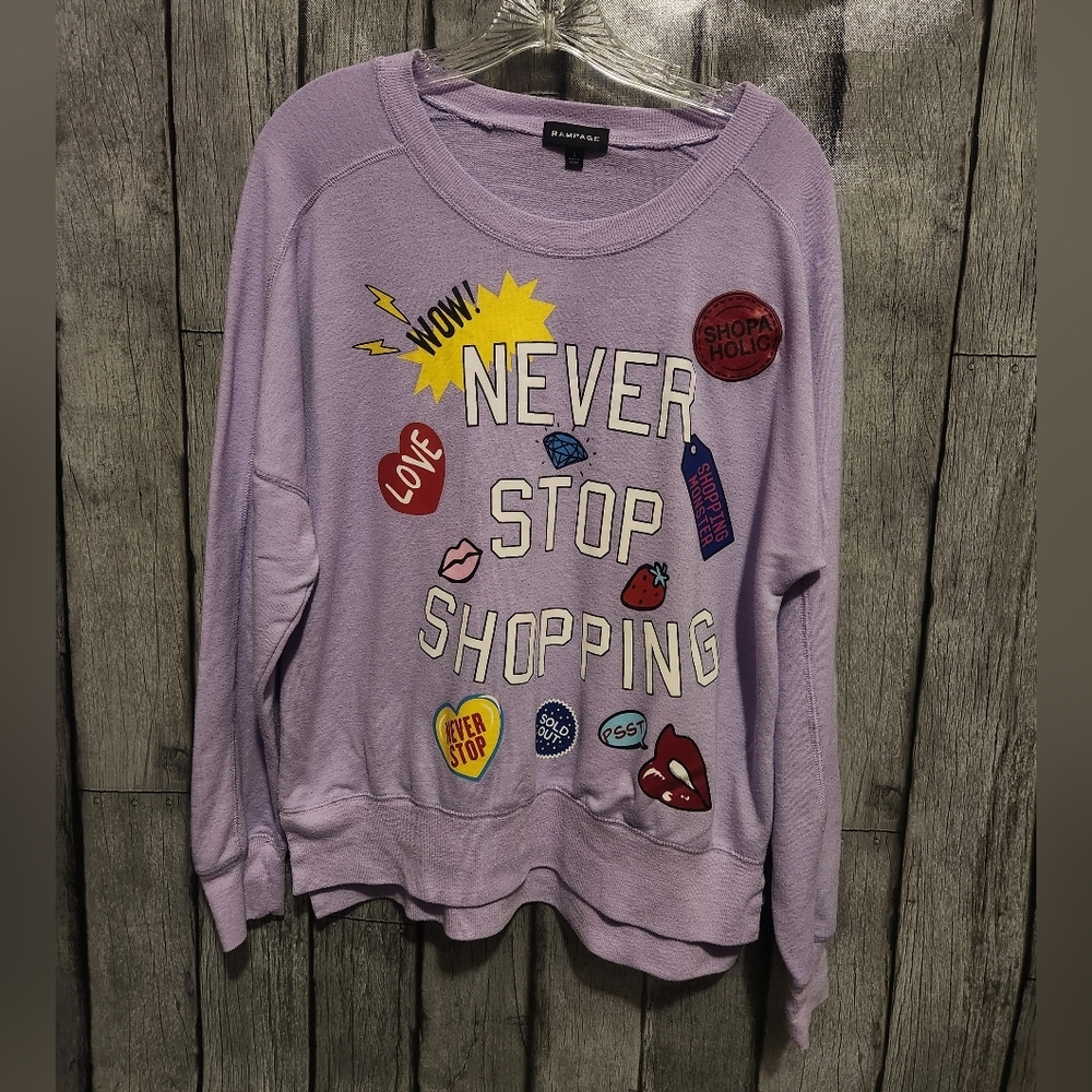 Never Stop Shopping Sweatshirt by Rampage